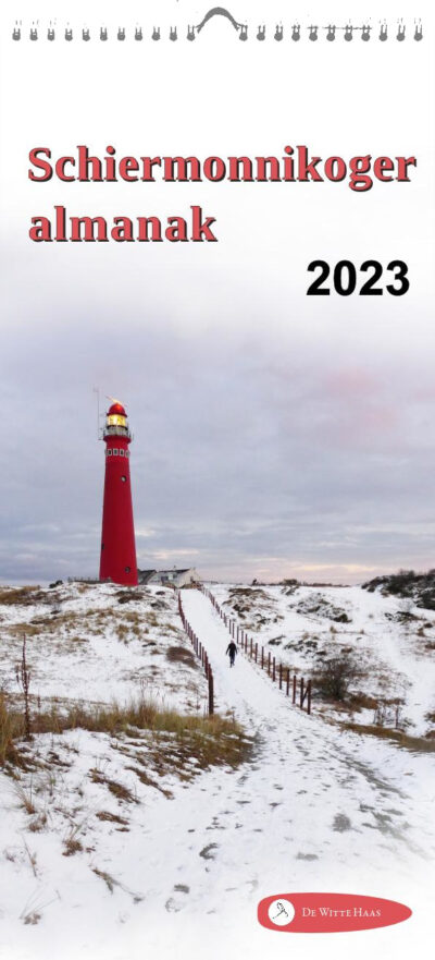 Voorpagina van de Schiermonnikoger almanak 2023 met foto van het pad naar de vuurtoren in de sneeuw (foto: Folkert Abma)