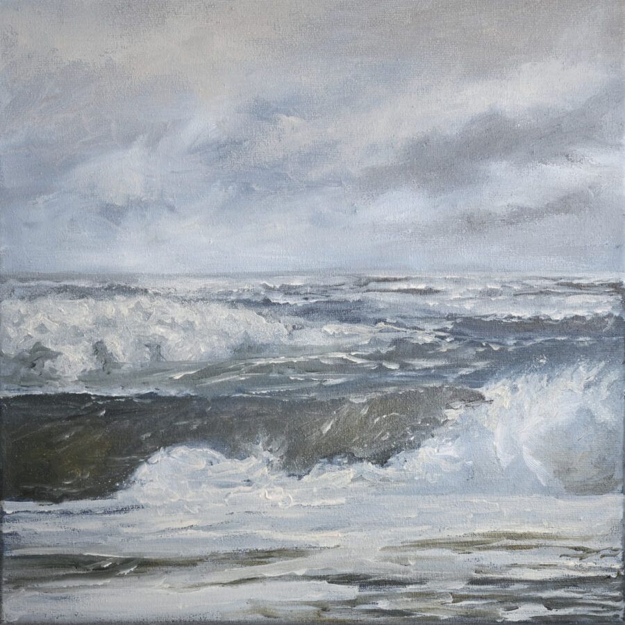 Schuimende golven en de branding